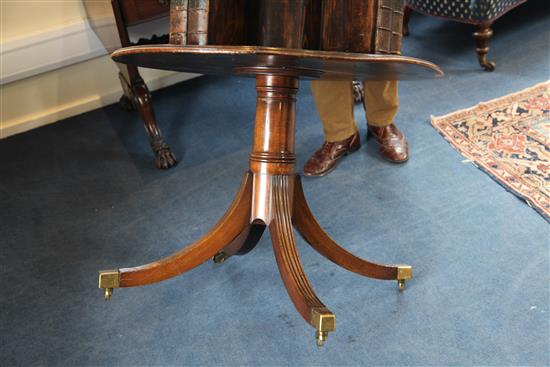 A George III mahogany revolving bookcase, circa 1820, H.4ft Diam.2ft 11in.